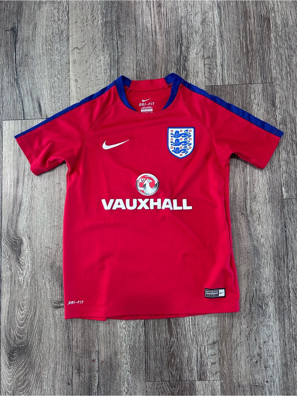Nike Kids Red Soccer Jersey with Blue Trim and England Crest
